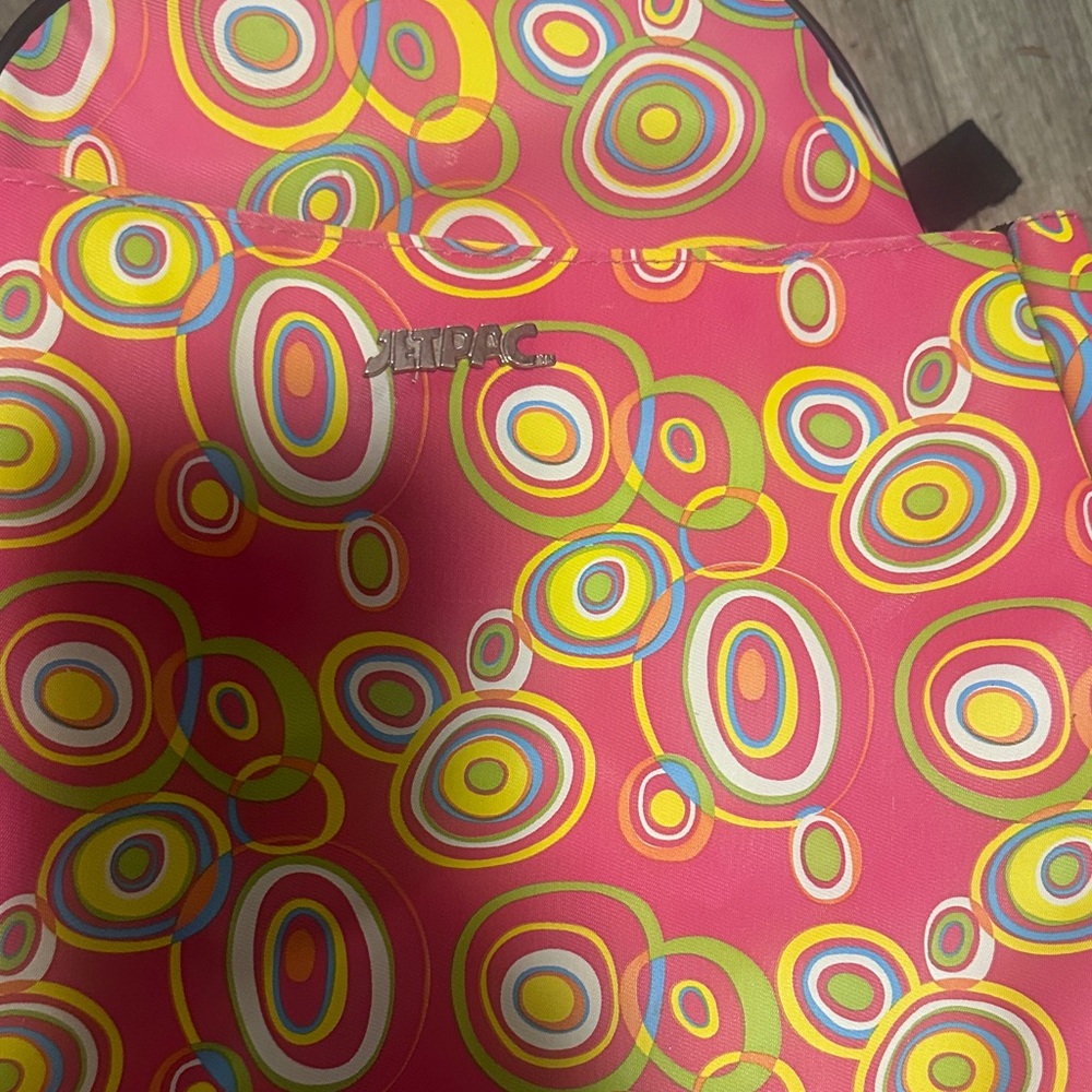 Jetpac Never Used

Colorful Circle Pattern Tennis Backpack